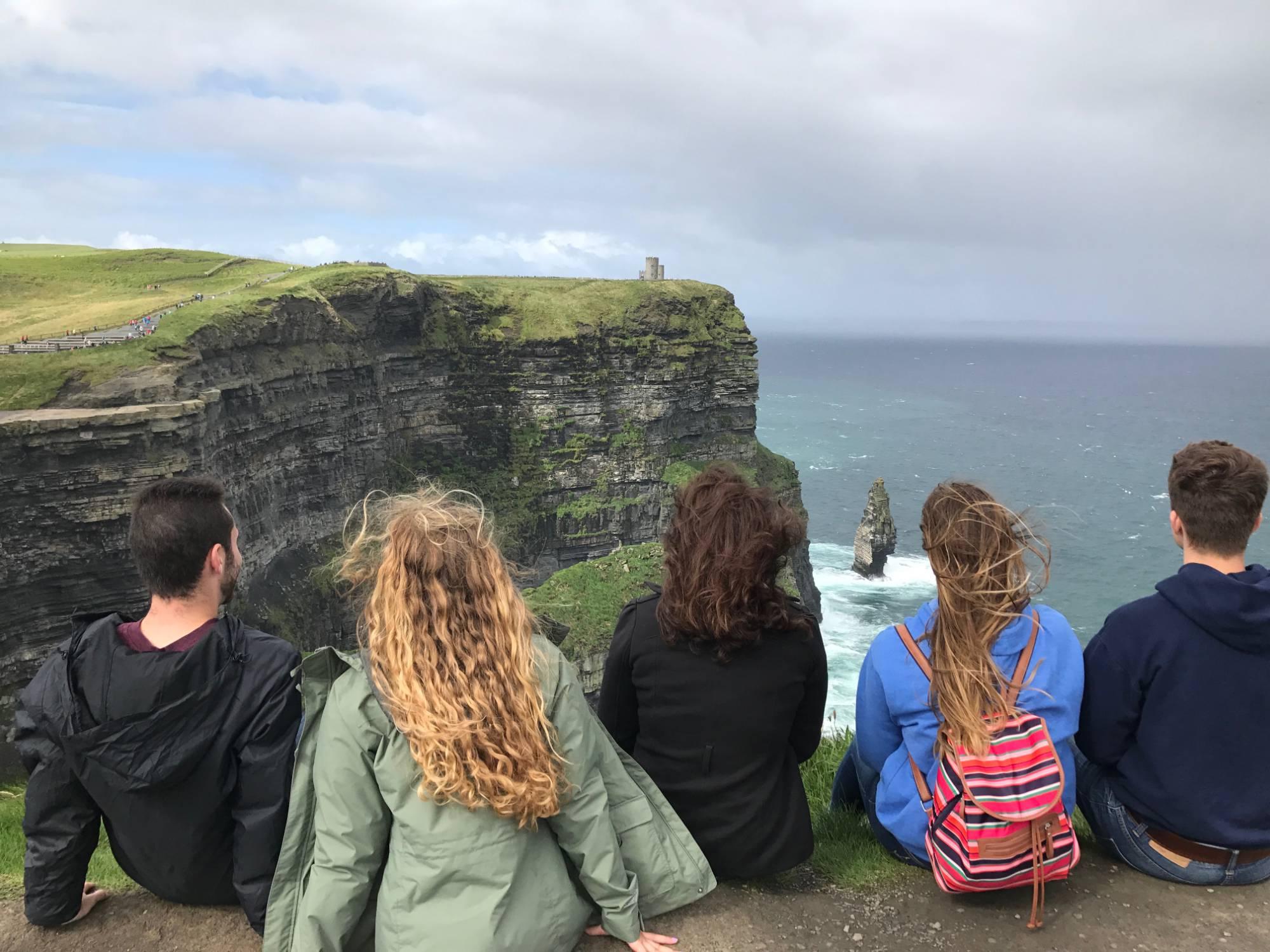 Students overlooking water